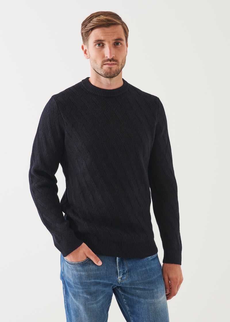 MERINO CABLE KNIT SWEATER