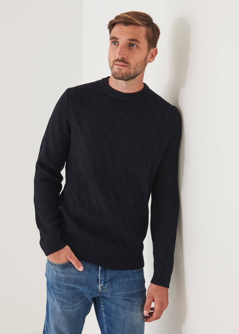 MERINO CABLE KNIT SWEATER