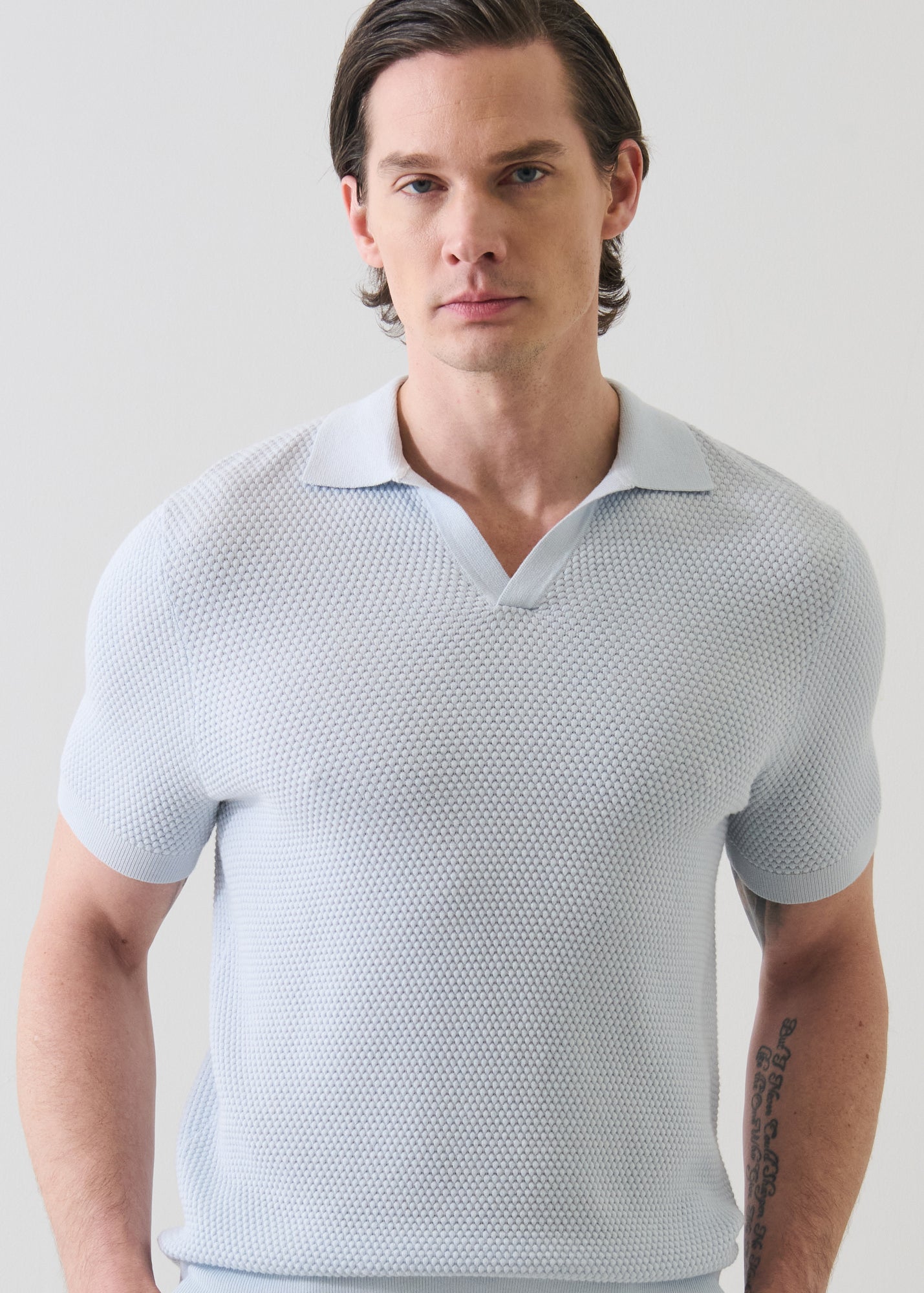 Cotton-Blend Bubble Stitch Knit Open Polo